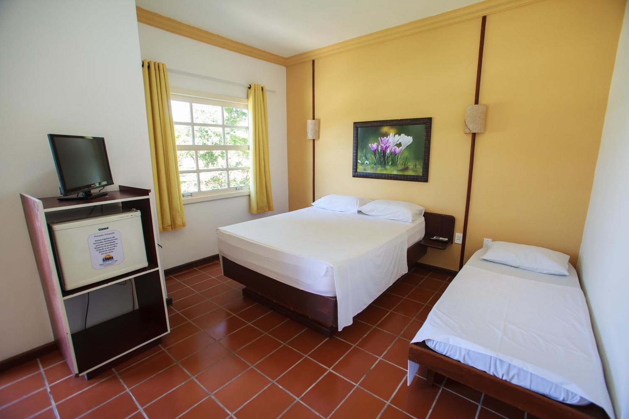 Quarto Quádruplo Clássico com Vista do Jardim